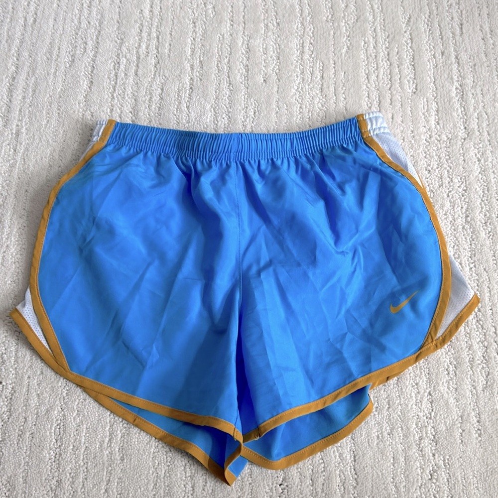 Youth sky blue and yellow standard fit athletic shorts Nike size M